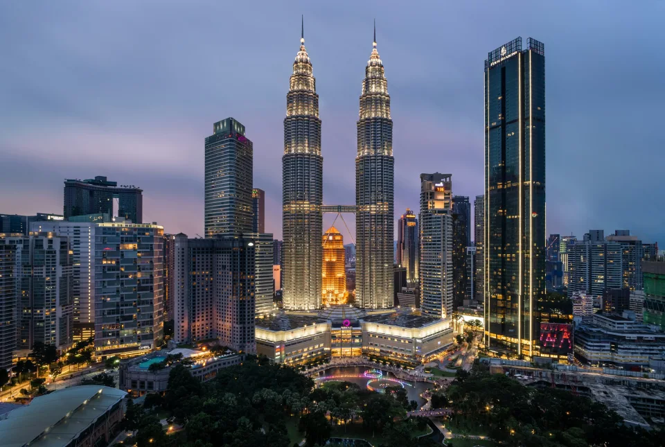 Petronas Towers and the Kuala Lumpur skyline at dusk