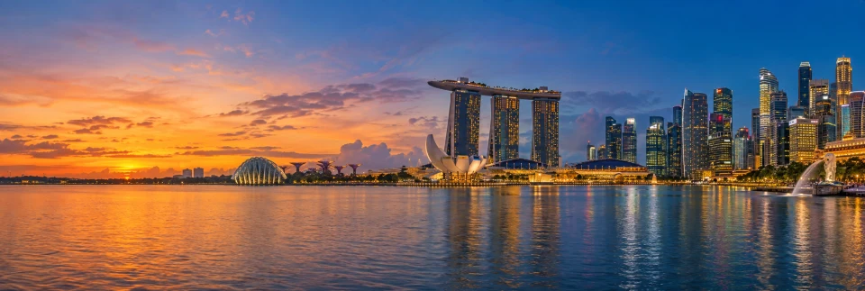 Illustrative Marina Bay Sands and Singapore skyline at dusk